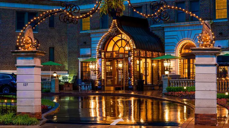 a building that has a fountain in front of it